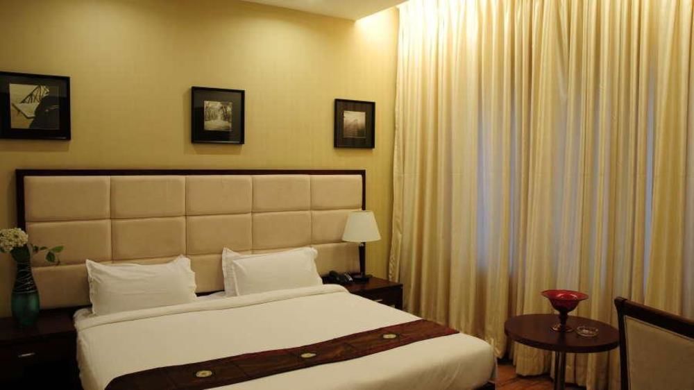 Lotus Park Hotel Bangalore Bagian luar foto
